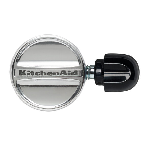 A close-up of a KitchenAid Tilt-Head Mixer attachment hub accessory pack.