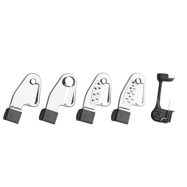 A row of metal clips with white tips.