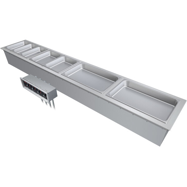 A stainless steel Hatco drop-in hot food well with four compartments.