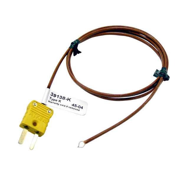 A brown cable with a yellow plug and a white label.