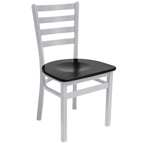 A BFM Seating Lima silver steel side chair with black wooden seat.