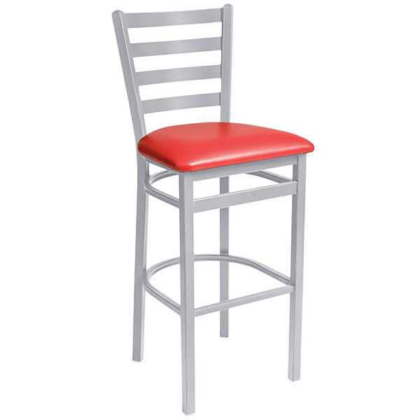 A BFM Seating bar height chair with a red vinyl cushion on a silver frame.
