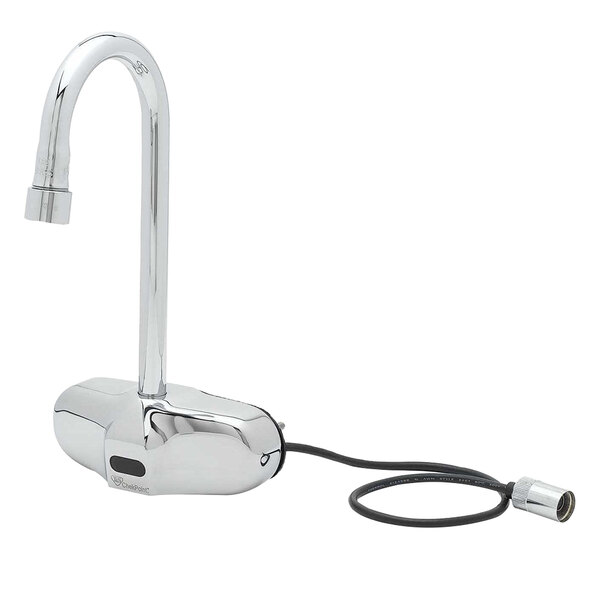 A close-up of a T&amp;S chrome wall mounted sensor faucet with a black cord.