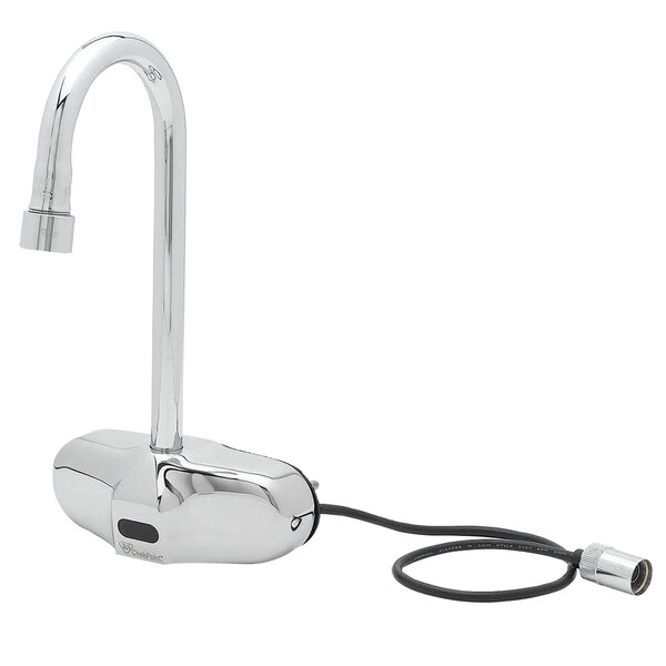 A silver T&S wall mounted sensor faucet with a cord.