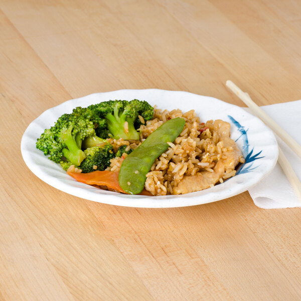 A Thunder Group Blue Bamboo melamine plate with rice and broccoli on it.