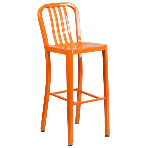 An orange Flash Furniture metal bar stool with a vertical slat back.
