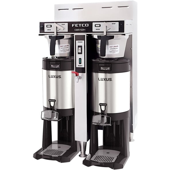 Two stainless steel Fetco twin automatic coffee brewers.