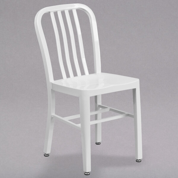 A white Flash Furniture metal chair with a backrest.