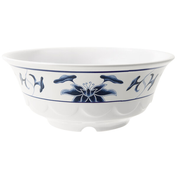 A white GET Melamine Wave bowl with blue and white water lily design.