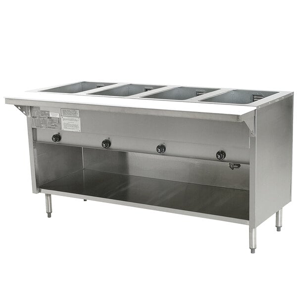 A stainless steel Eagle Group electric steam table with an enclosed base on a counter in a commercial kitchen.