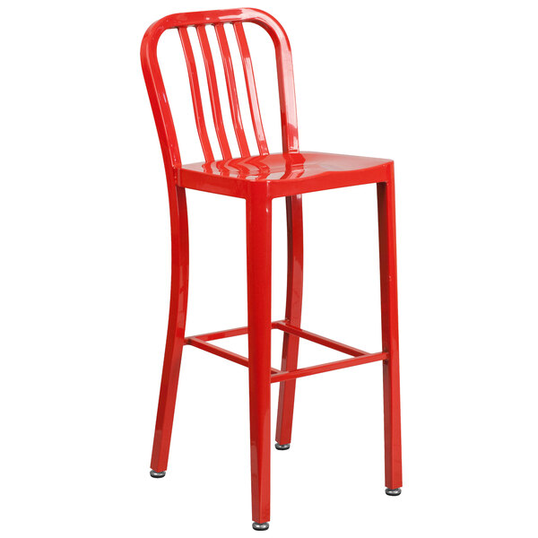 A Flash Furniture red metal bar stool with a vertical slat back.