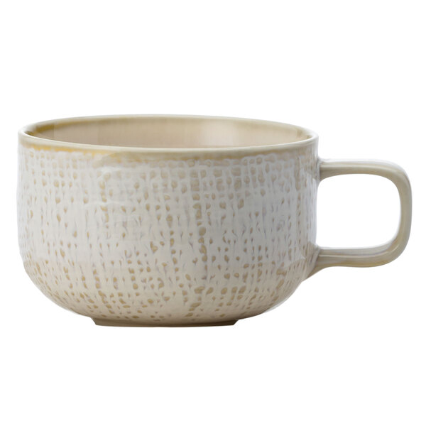 A white porcelain Oneida Knit coffee cup with a handle.