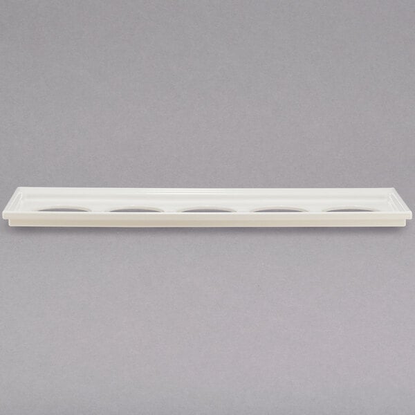 A white rectangular Bon Chef adapter plate with 5 holes.