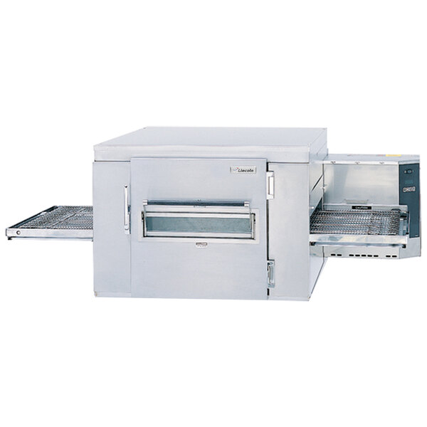 A Lincoln 1400 Series conveyor oven with a sliding door.