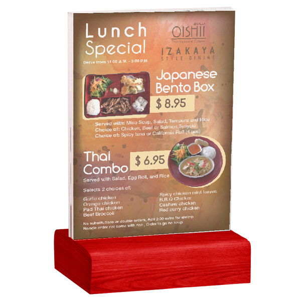 A Menu Solutions clear acrylic table tent on a red berry wood stand.