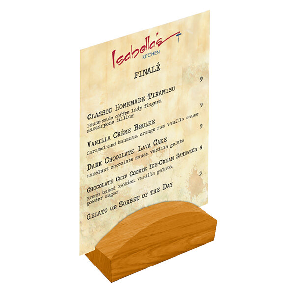 A Menu Solutions country oak wood rounded card holder on a table with a menu.