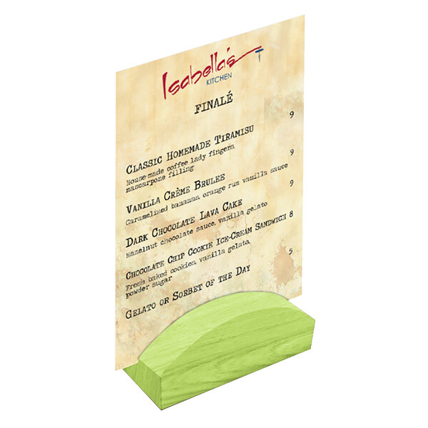 A lime wood rounded card holder on a table with a menu.