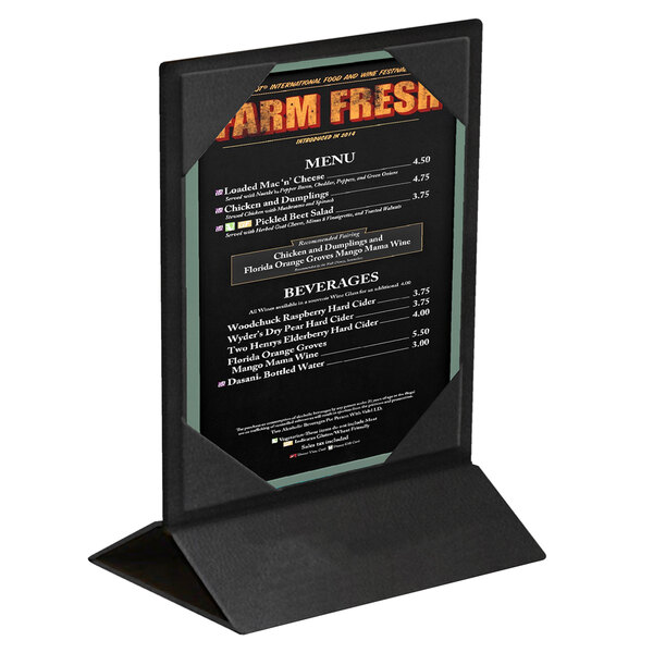 A black Menu Solutions table tent with picture corners holding a menu on a stand.