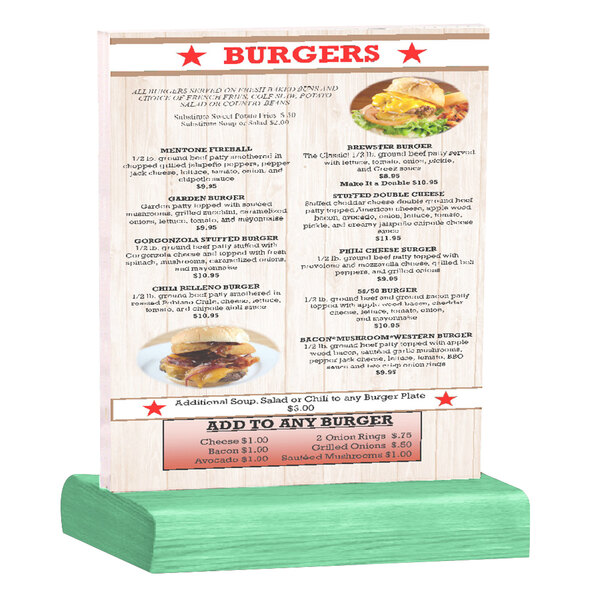 A Menu Solutions clear acrylic table tent with solid washed teal wood base holding a menu on a table with a burger on it.