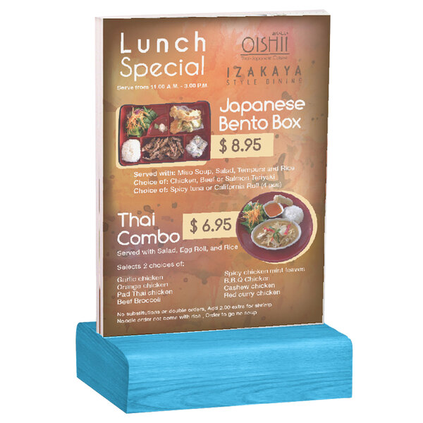 A Menu Solutions clear acrylic table tent with a solid blue wood base holding a menu.