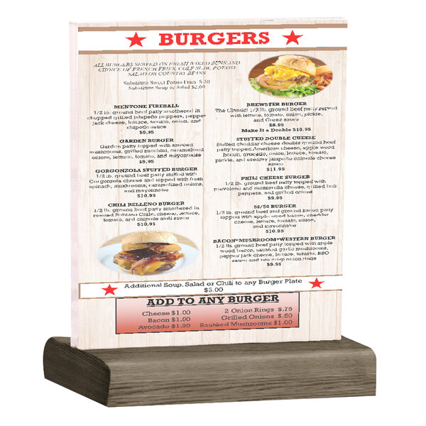 A Menu Solutions clear acrylic table tent with a weathered walnut wood base holding a menu with a burger on it.