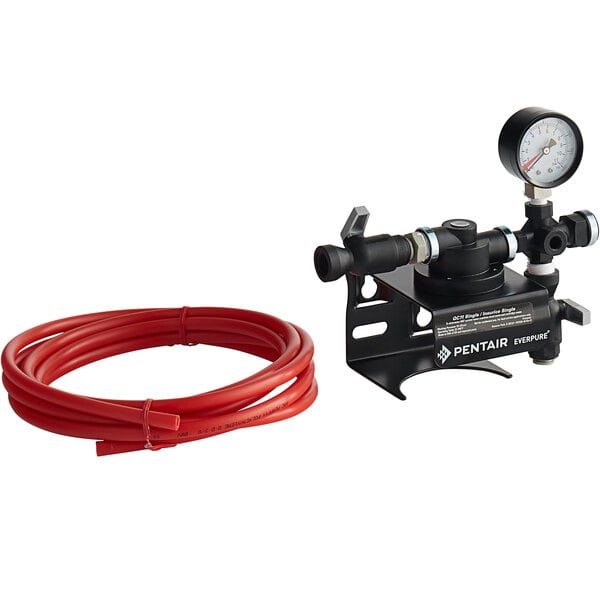 A black Everpure filter head with a gauge and red tube.