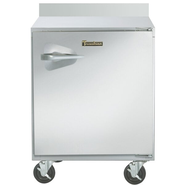 A Traulsen stainless steel worktop freezer with a door and a handle.