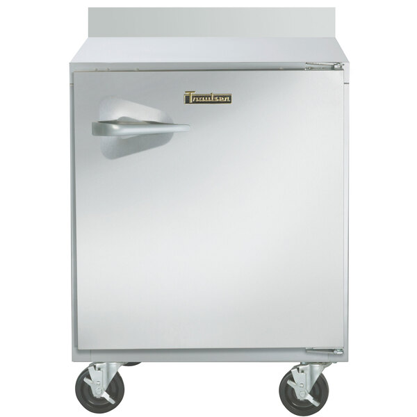 A Traulsen stainless steel worktop freezer with a door and handle.