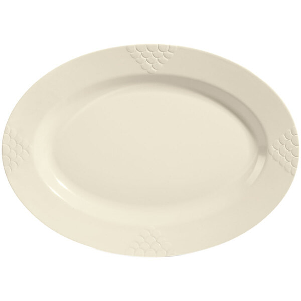 A white oval platter with a pattern on the edge.