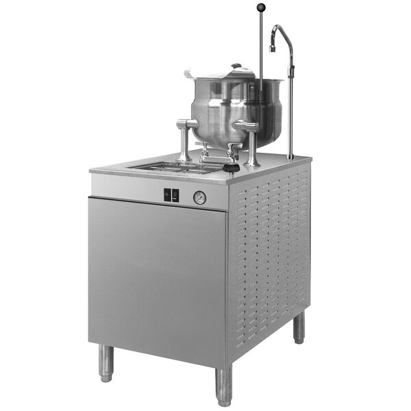 A Cleveland stainless steel electric steam kettle on a modular machine base.