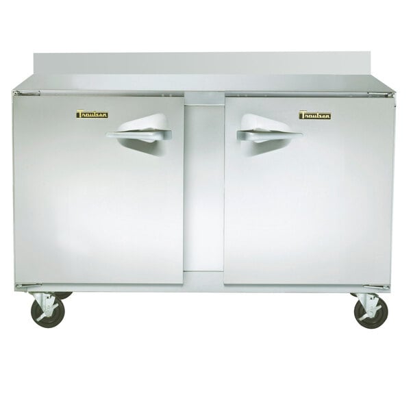 A stainless steel Traulsen worktop freezer with two doors.
