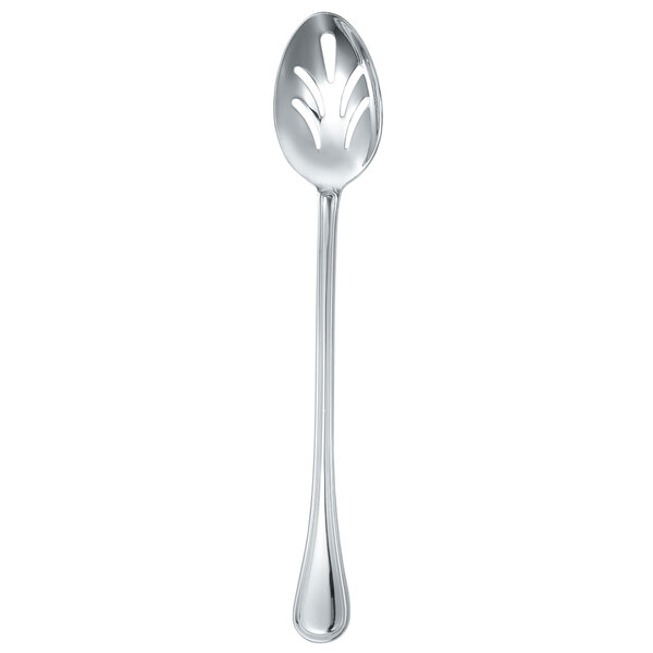 A Walco stainless steel slotted spoon with a carved design on the handle.