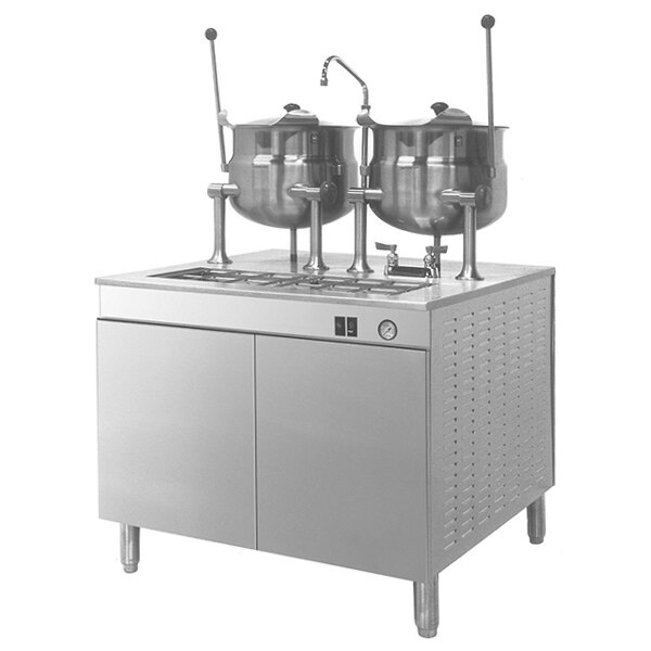 A Cleveland Electric Tilting Steam Kettle with 2 pots on top.