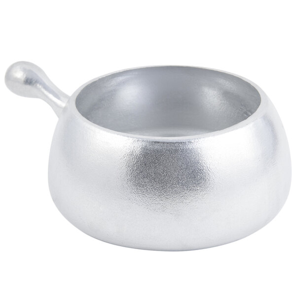 A close-up of a silver Bon Chef stainless steel fondue pot with a handle.