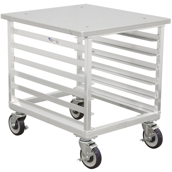 A silver metal DoughXpress mobile cart with wheels.