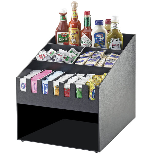 A black Cal-Mil Classic condiment organizer with various condiments and ketchup.