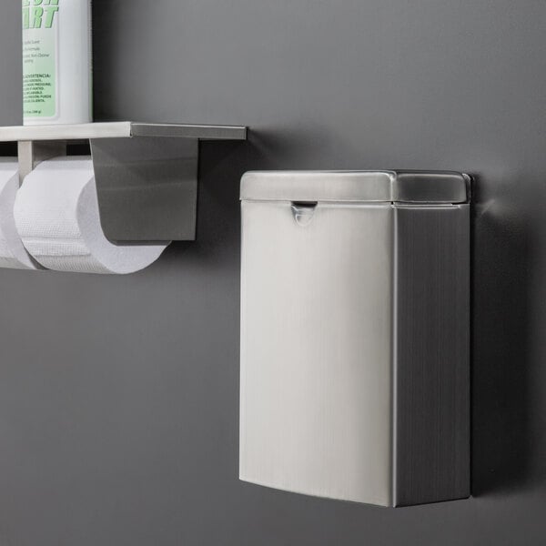 A Lavex stainless steel wall mount sanitary napkin receptacle on a wall.