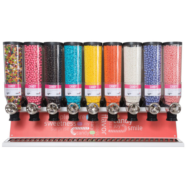 A row of Rosseto candy dispensers with different colored candies.