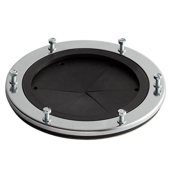 A round chrome and black adapter plate for a garbage disposal.