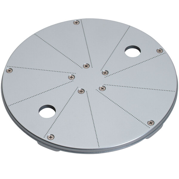 A Waring 1/64" pulping disc, a circular metal plate with holes in it.