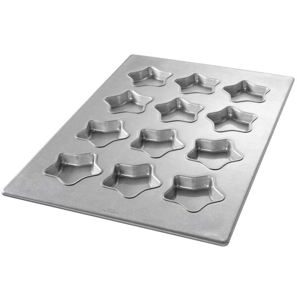 A Chicago Metallic aluminized steel muffin pan with star-shaped molds.