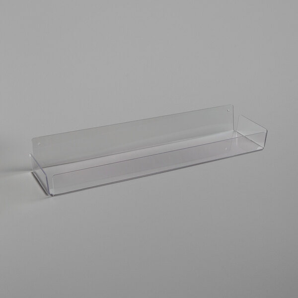 A white rectangular APW Wyott holding shelf with a clear plastic handle.