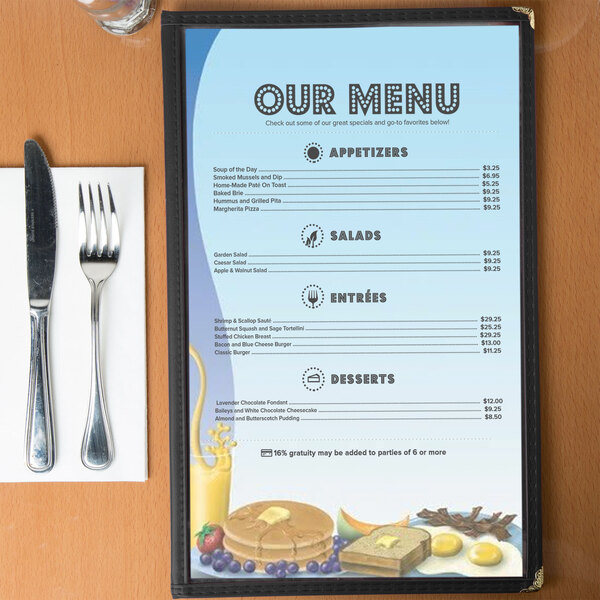 Menu paper with a coffee shop themed table setting on a table with a fork.