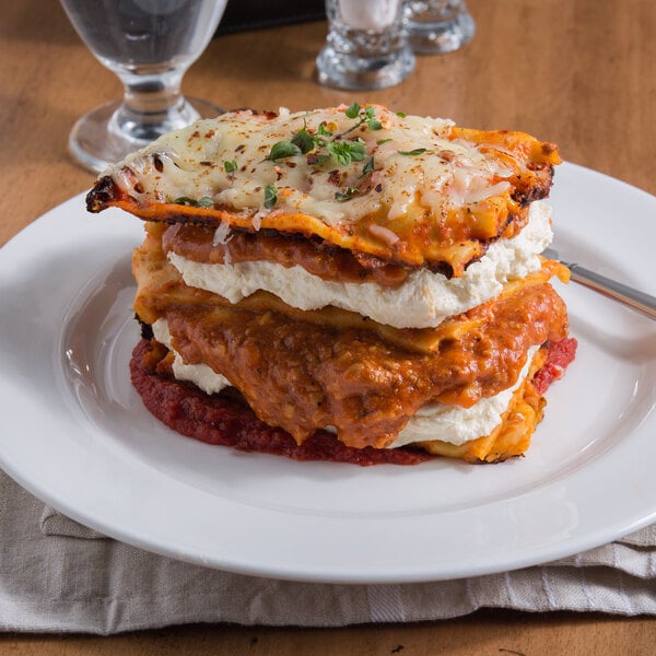 A stack of Regal long lasagna sheets on a plate on a table.