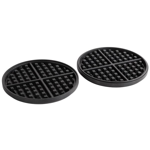 A pair of black waffle grids with square holes.