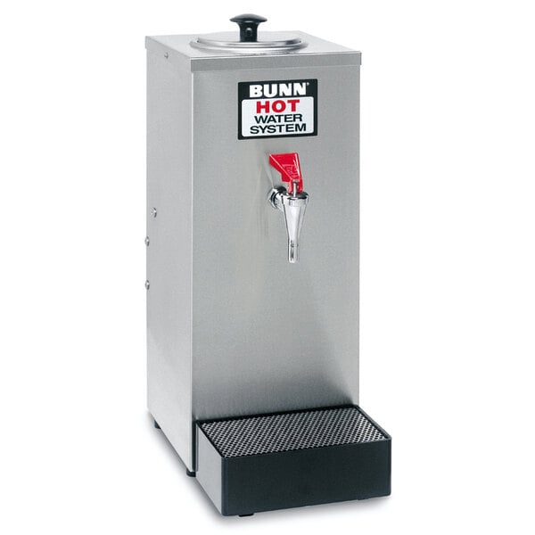 A silver metal Bunn hot water dispenser with a red tap.