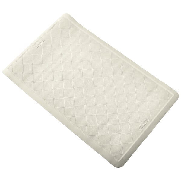 A white Rubbermaid shower mat with a diamond pattern.