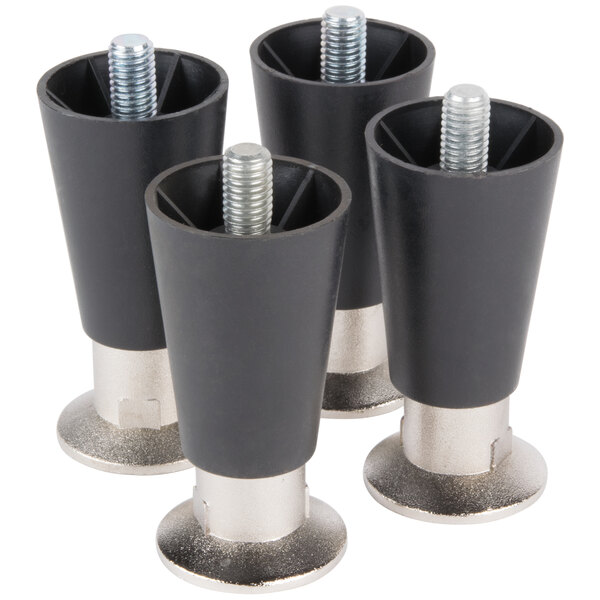 Four black metal Manitowoc refrigeration equipment legs with screws on them.