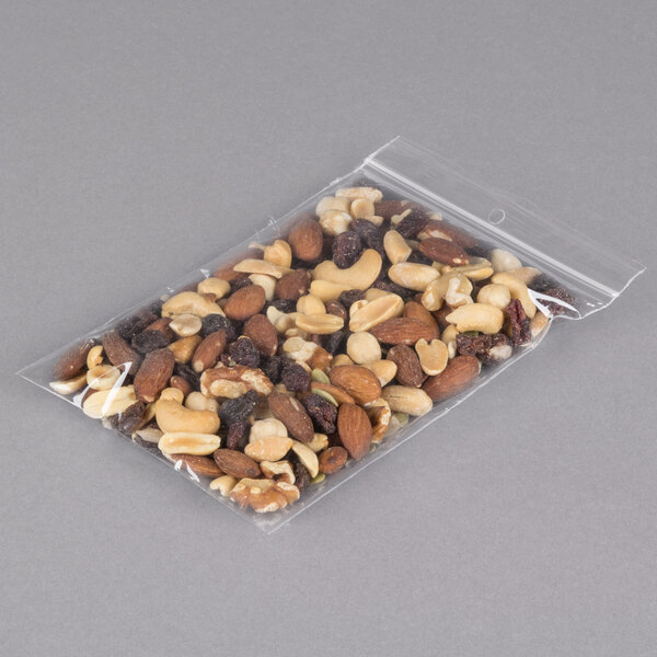 A plastic bag of nuts with a hang hole.