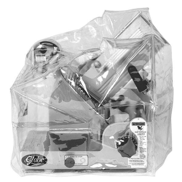 A plastic bag with a Globe slicer cover inside.